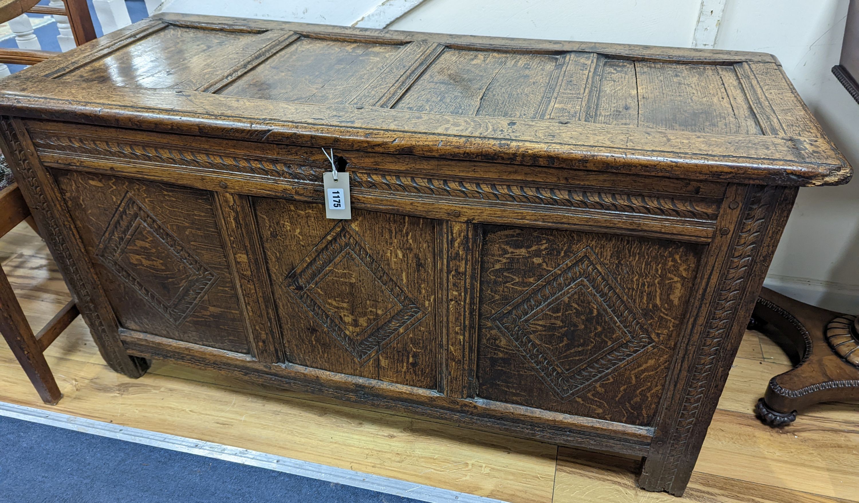 A 17th/18th century panelled oak coffer, length 122cm, depth 50cm, height 62cm